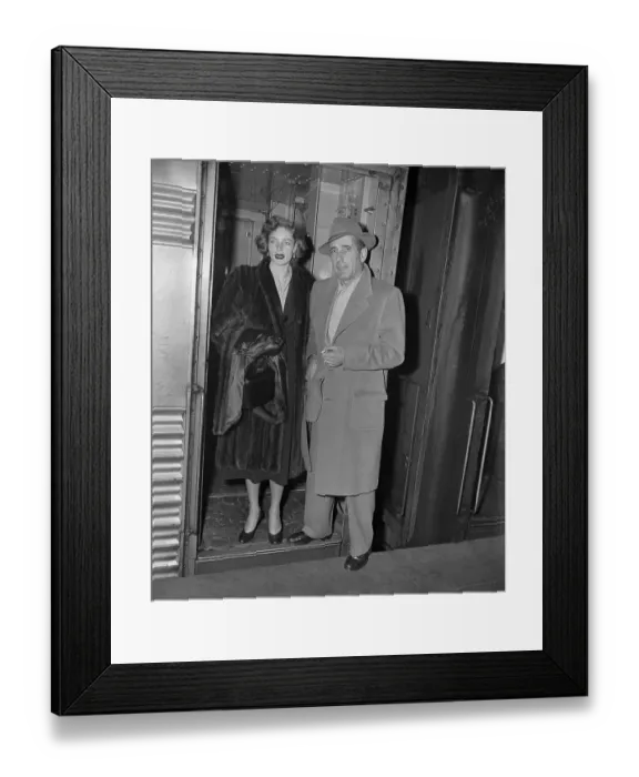 Framed Print : Lauren Bacall and Humphrey Bogart Leaving Train Framed Print : Lauren Bacall and Humphrey Bogart Leaving Train