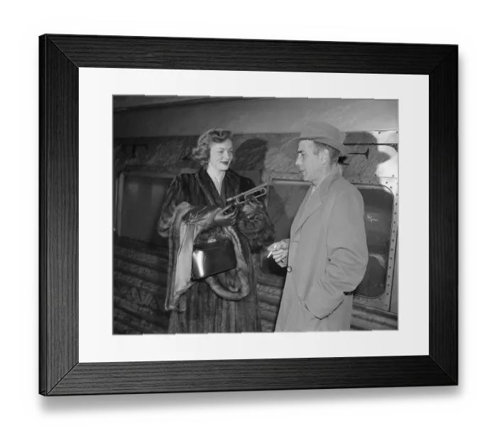 Framed Print : Lauren Bacall and Humphrey Bogart Standing by Train Framed Print : Lauren Bacall and Humphrey Bogart Standing by Train