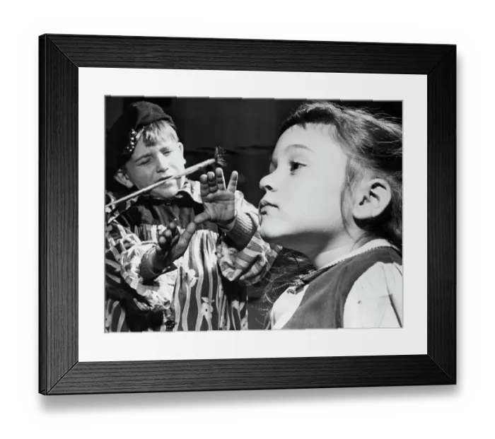 Framed Print : Child Artist In Smock Studying Model