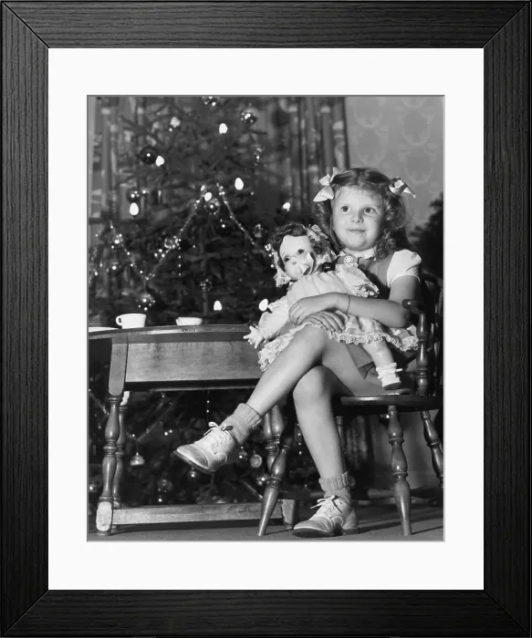 Framed Print : Girl with New Christmas Doll Framed Print : Girl with New Christmas Doll