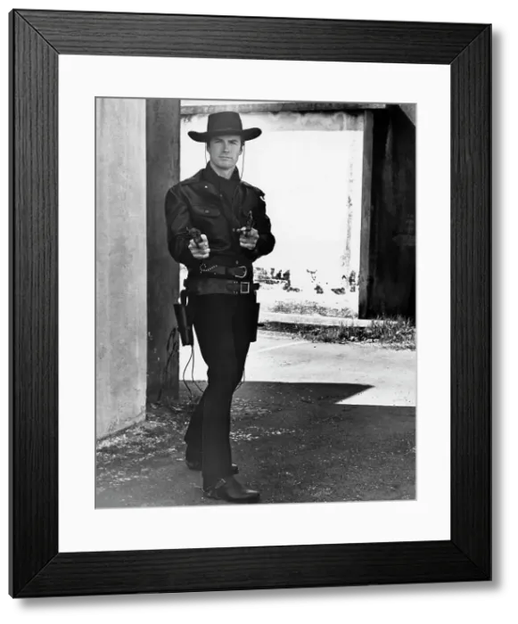 Framed Print : Young Clint Eastwood in Gunslinger Pose Framed Print : Young Clint Eastwood in Gunslinger Pose