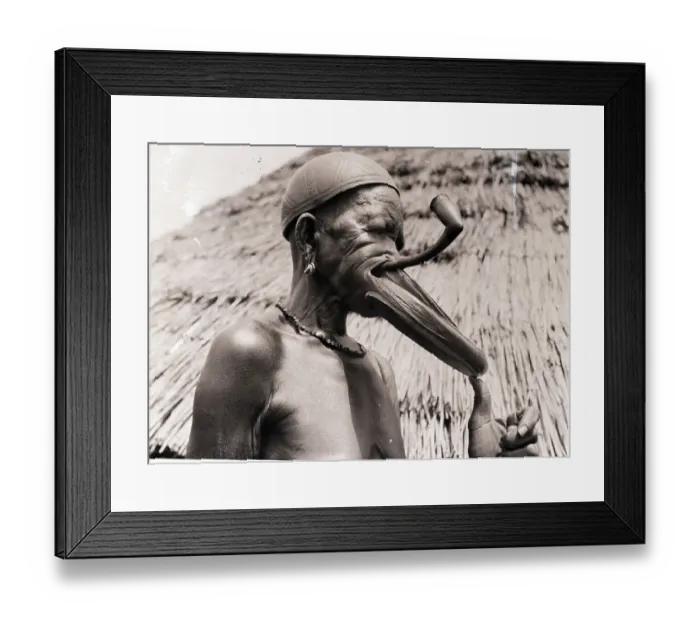 Framed Print : Tribesman Showing His Lip Discs