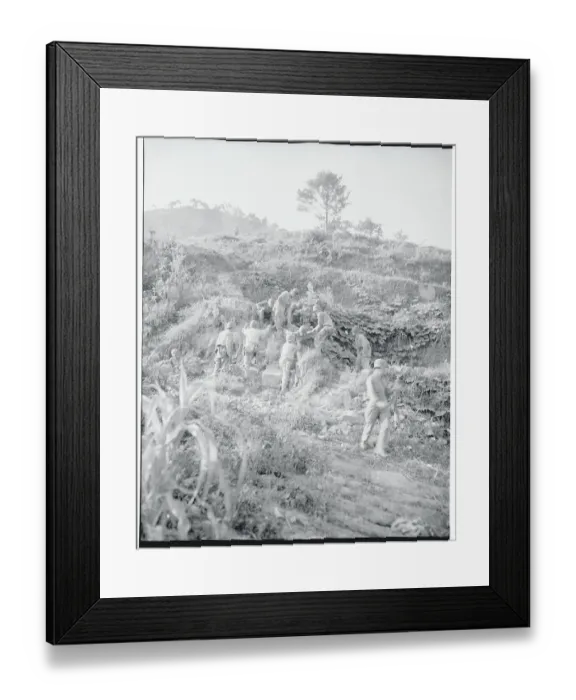 Framed Print : Soldiers Carrying the Wounded Down Terrain