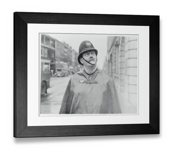 Framed Print : Policeman Wearing Rain Attire Framed Print : Policeman Wearing Rain Attire