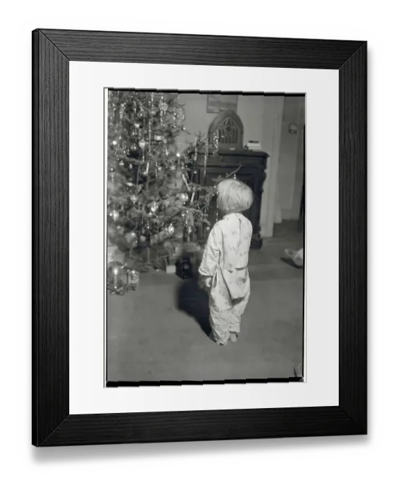Framed Print : Young Jessie Douglas Mesmerized by Christmas Tree Framed Print : Young Jessie Douglas Mesmerized by Christmas Tree