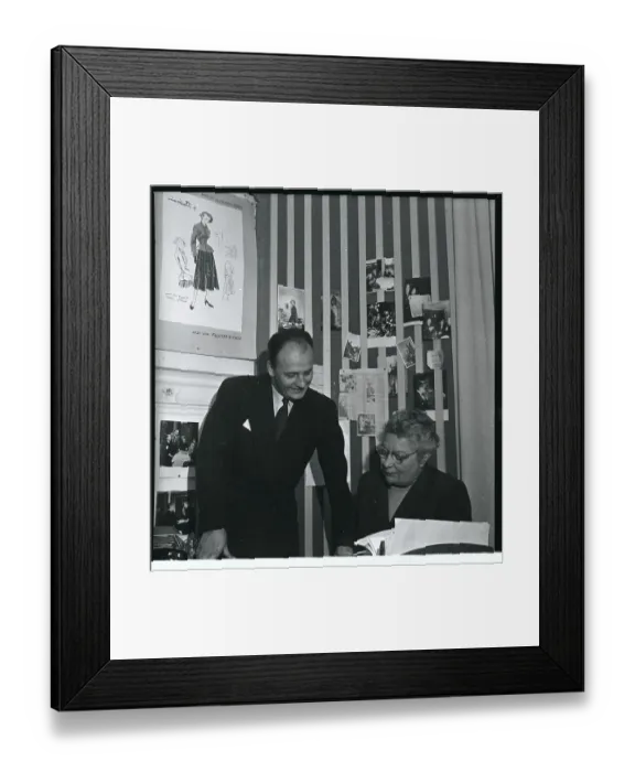 Framed Print : Pierre Balmain Talking with his Assistant Framed Print : Pierre Balmain Talking with his Assistant