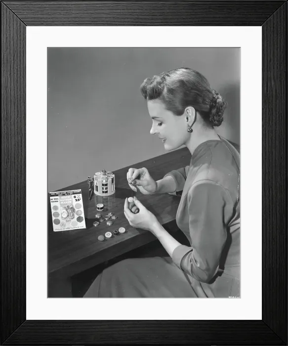 Framed Print : Woman Making Buttons with Kit Framed Print : Woman Making Buttons with Kit