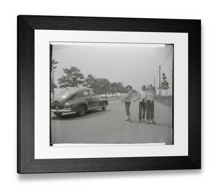 Framed Print : Female Hitchhikers Receiving a Ride Framed Print : Female Hitchhikers Receiving a Ride