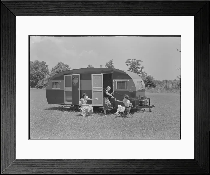 Framed Print : Women and Camping Trailer Framed Print : Women and Camping Trailer