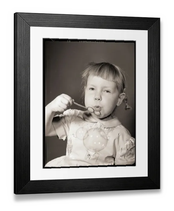 Framed Print : Girl Blowing Bubbles Framed Print : Girl Blowing Bubbles