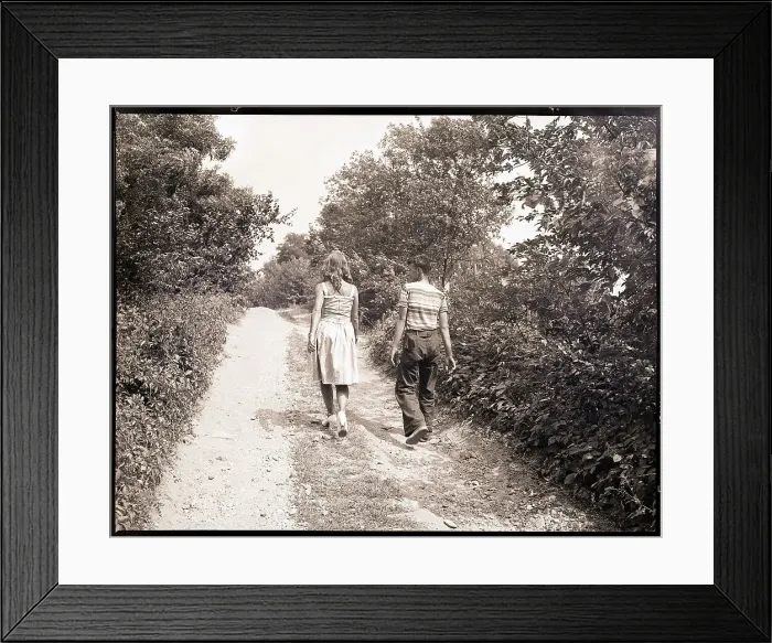 Framed Print : Boy and Girl Walking on Country Road Framed Print : Boy and Girl Walking on Country Road