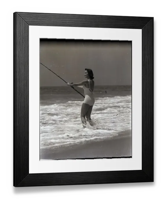 Framed Print : Woman Standing in Surf to Fish Framed Print : Woman Standing in Surf to Fish