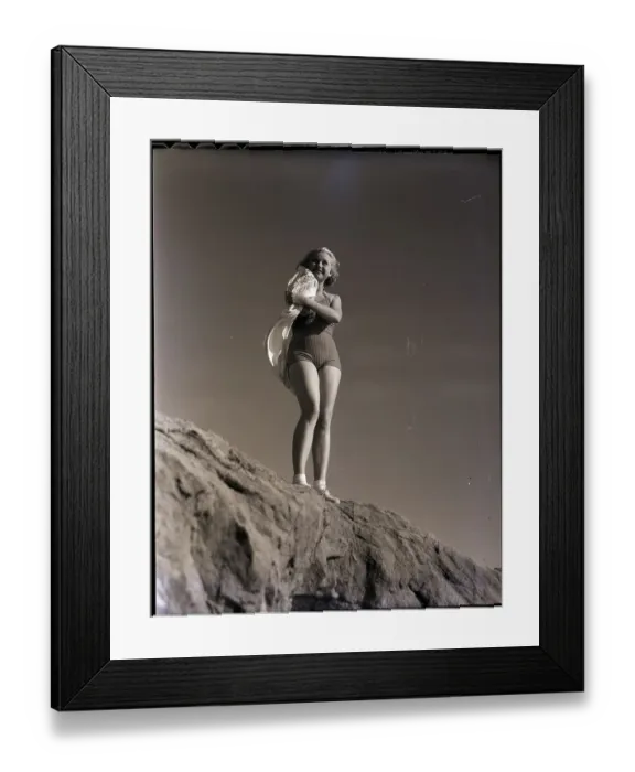 Framed Print : Woman on Coastal Rock with Her Scarf Framed Print : Woman on Coastal Rock with Her Scarf