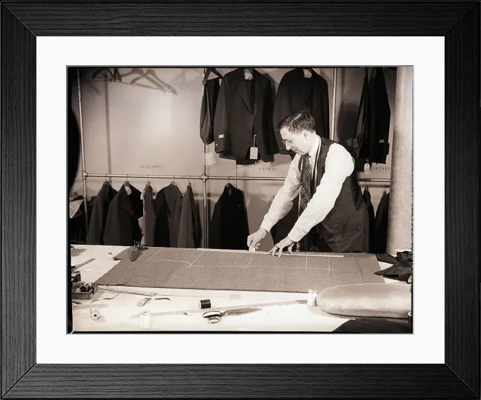 Framed Print : Tailor Cutting Fabric Framed Print : Tailor Cutting Fabric