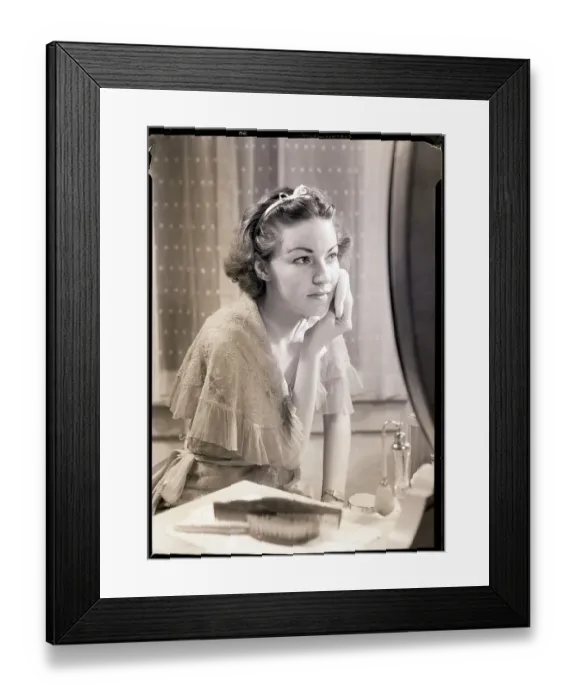 Framed Print : Girl Applying Facial Powder Framed Print : Girl Applying Facial Powder