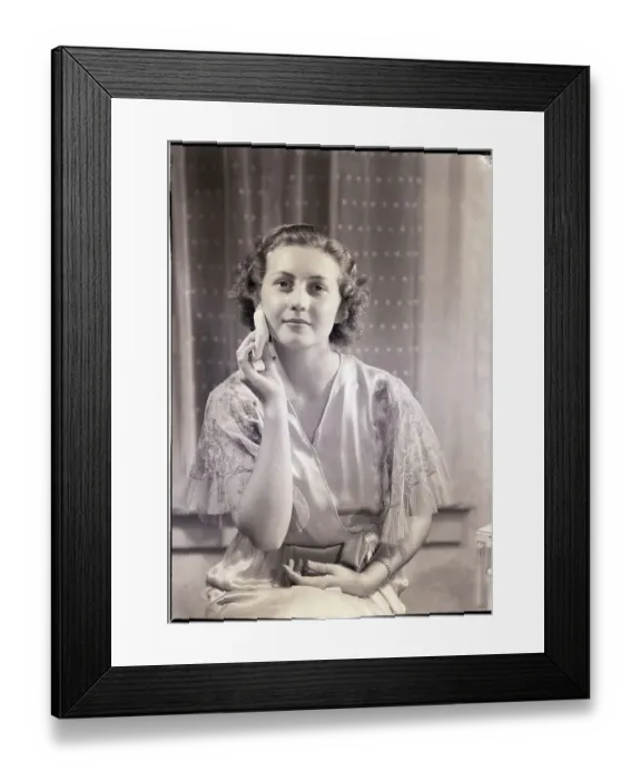Framed Print : Woman Applying Face Powder Framed Print : Woman Applying Face Powder
