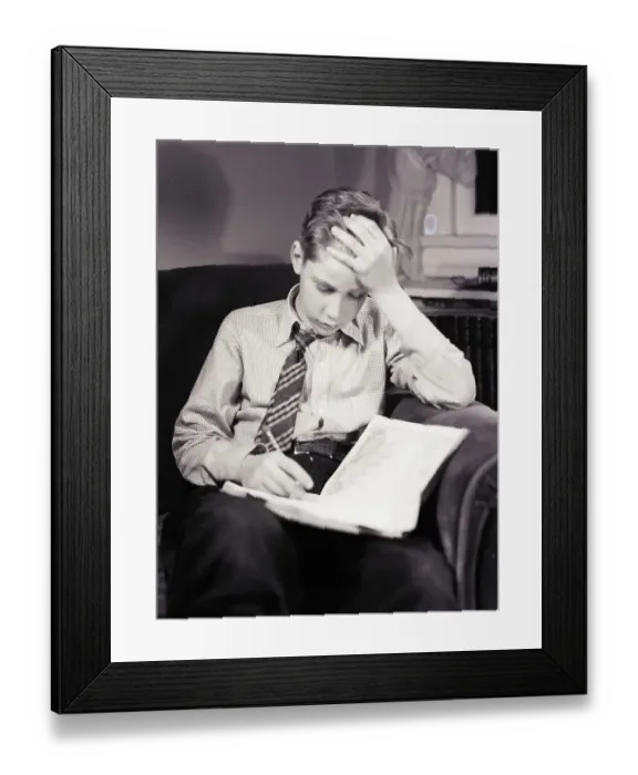 Framed Print : Boy Studying Framed Print : Boy Studying