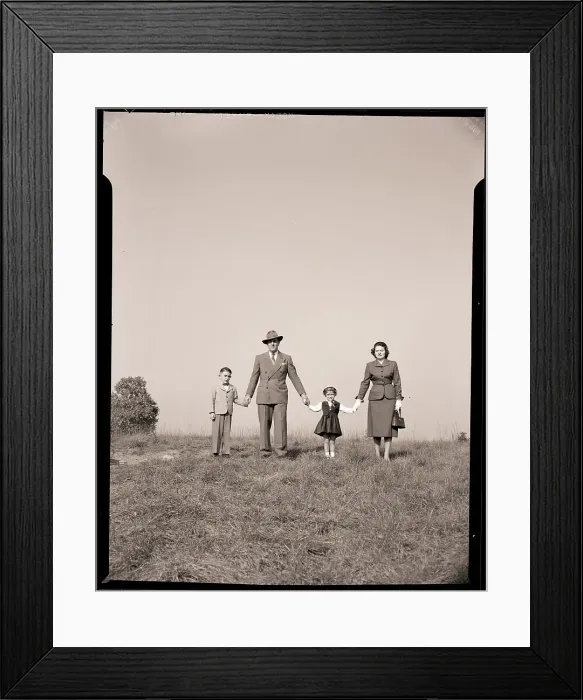 Framed Print : Family Holding Hands in Open Field Framed Print : Family Holding Hands in Open Field