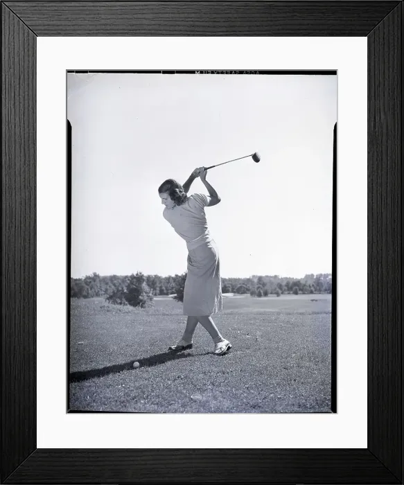 Framed Print : Woman Swinging Golf Club Framed Print : Woman Swinging Golf Club