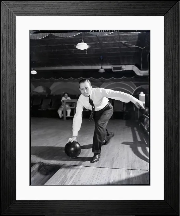 Framed Print : Man Bowling in Tie Framed Print : Man Bowling in Tie