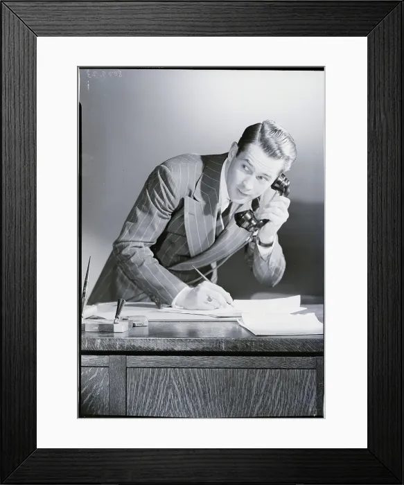 Framed Print : Businessman Talking on the Telephone Framed Print : Businessman Talking on the Telephone