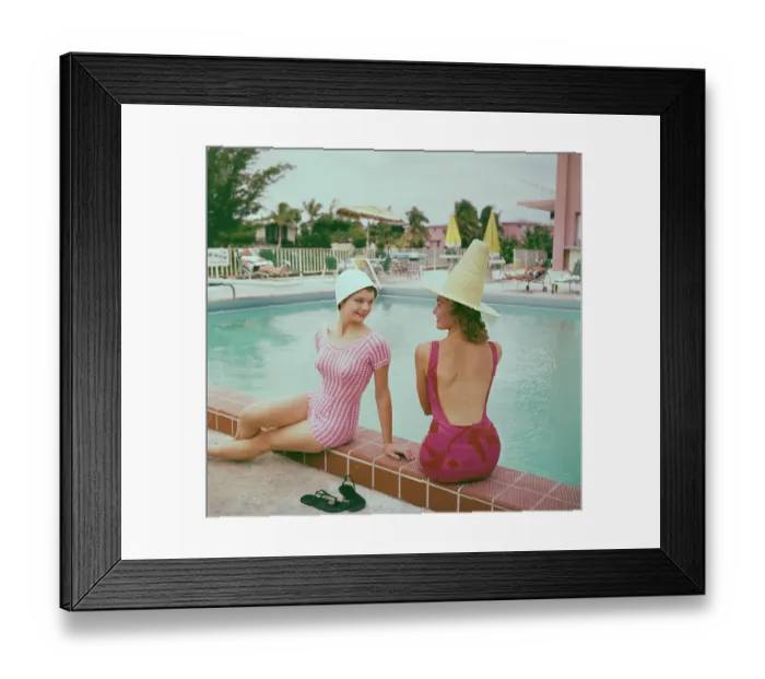 Framed Print : Fashionable Women Lounging at Poolside Framed Print : Fashionable Women Lounging at Poolside