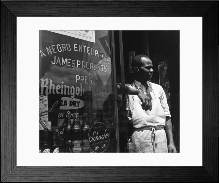 Framed Print : African American Store Owner in Front of Store Framed Print : African American Store Owner in Front of Store