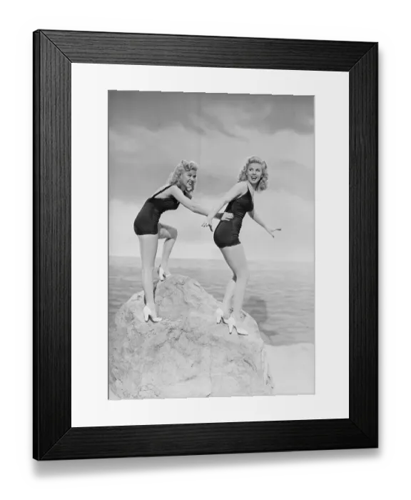 Framed Print : Wilde Twins Posing atop a Rock in Swimsuits