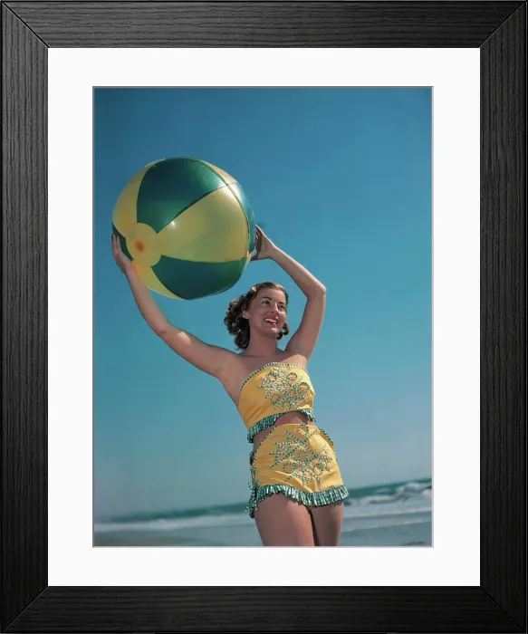 Framed Print : Pat Hall Holding a Beach Ball