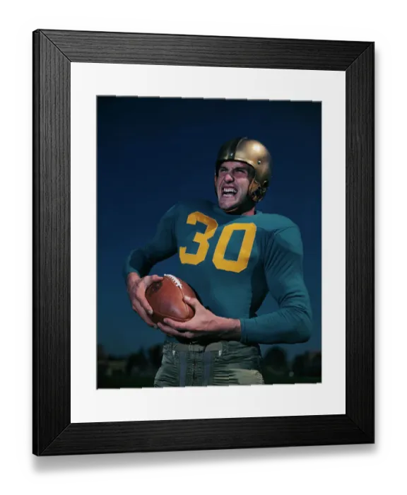 Framed Print : Bob Wilkinson of UCLA Holding Football Framed Print : Bob Wilkinson of UCLA Holding Football