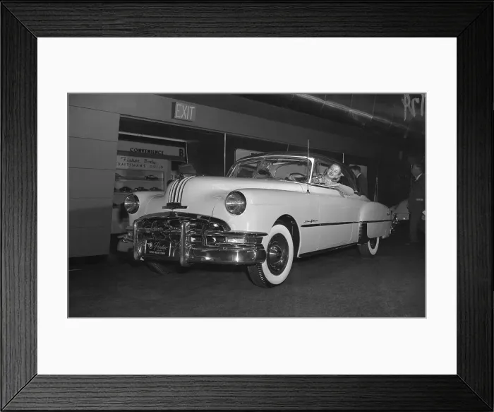 Framed Print : Woman Peering Out of Car Window Framed Print : Woman Peering Out of Car Window
