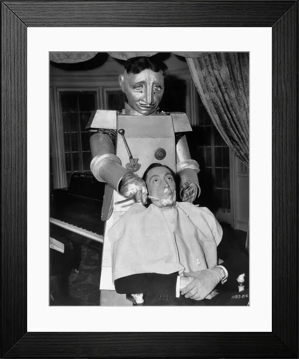 Framed Print : Man Being Shaved by Robot Barber Framed Print : Man Being Shaved by Robot Barber