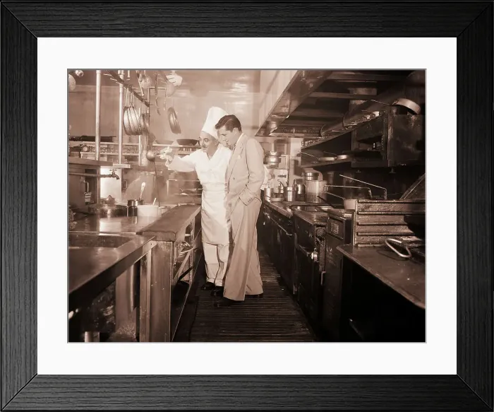 Framed Print : Nicky Hilton in Kitchen with Chef Framed Print : Nicky Hilton in Kitchen with Chef