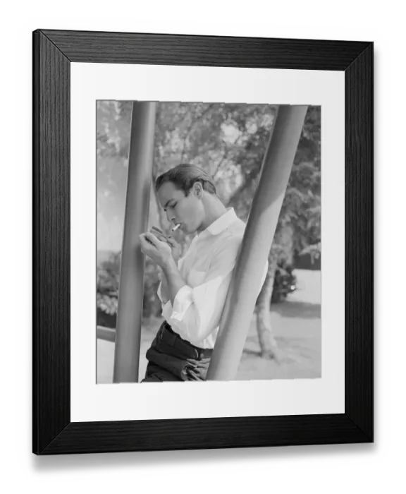 Framed Print : Marlon Brando Lighting a Cigarette Framed Print : Marlon Brando Lighting a Cigarette