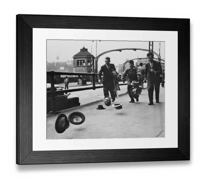 Framed Print : Men Attempting to Capture Windblown Hats Framed Print : Men Attempting to Capture Windblown Hats