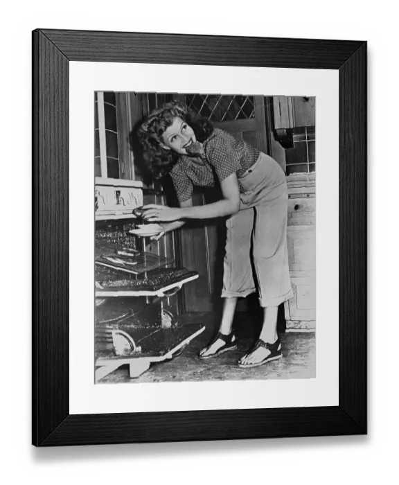 Framed Print : Rita Hayworth Eating a Snack Framed Print : Rita Hayworth Eating a Snack