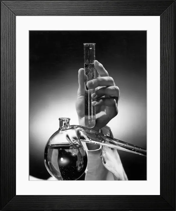 Framed Print : Hand Holding Test Tube