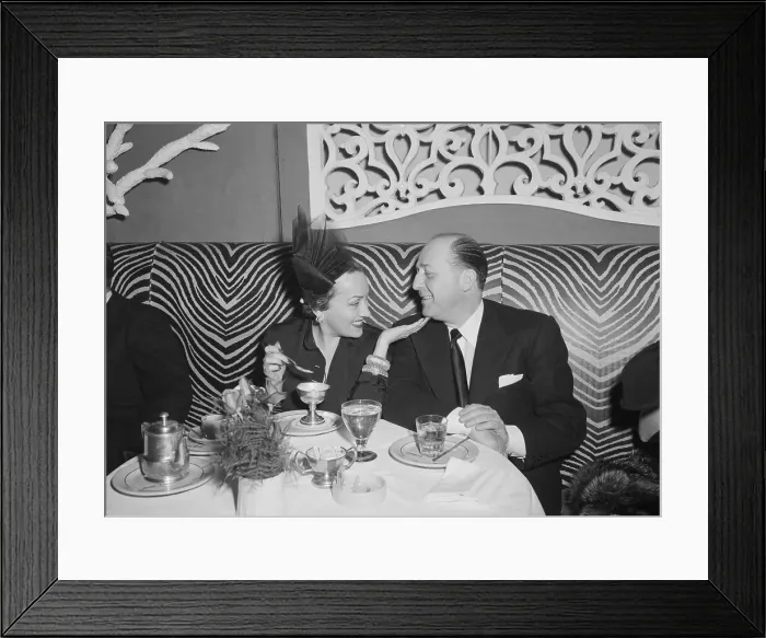 Framed Print : Gloria Swanson and Date at the El Morocco Framed Print : Gloria Swanson and Date at the El Morocco