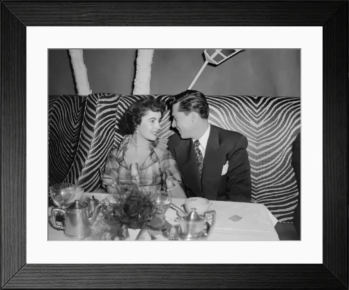 Framed Print : Actress Elizabeth Taylor and Conrad Hilton Jr. at the El Morocco Framed Print : Actress Elizabeth Taylor and Conrad Hilton Jr. at the El Morocco