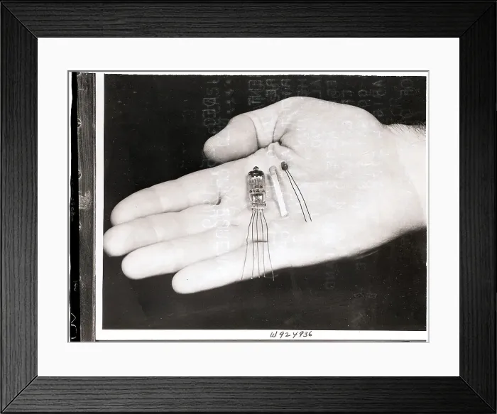 Framed Print : Hand Holding Communication Equipment