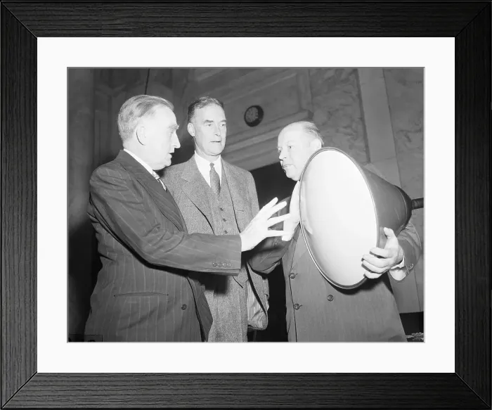 Framed Print : Man Holding TV Tube Talks to Senator Framed Print : Man Holding TV Tube Talks to Senator