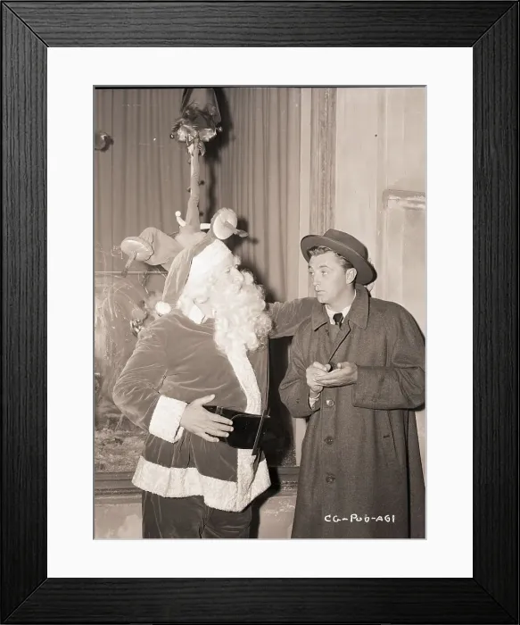 Framed Print : Robert Mitchum Interviewing Santa Framed Print : Robert Mitchum Interviewing Santa