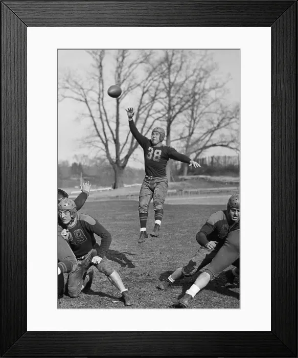 Framed Print : Football Player Trying to Catch a Pass Framed Print : Football Player Trying to Catch a Pass