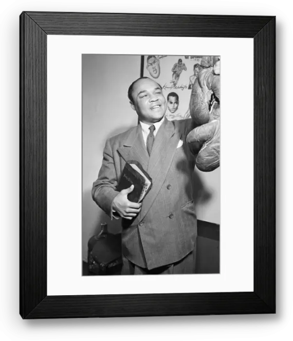 Framed Print : Henry Armstrong with Bible and Boxing Gloves Framed Print : Henry Armstrong with Bible and Boxing Gloves