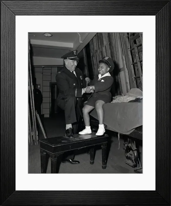 Framed Print : Police Officer With Child Framed Print : Police Officer With Child