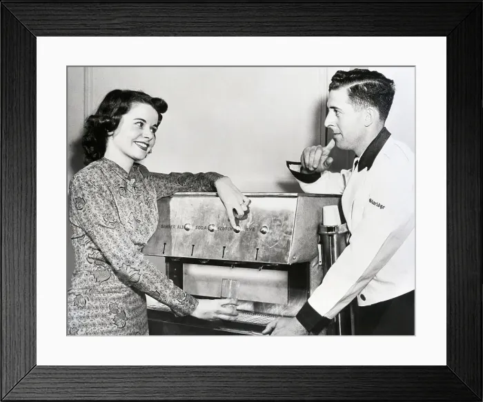 Framed Print : Robot Barkeep; Woman Makes Drink With It Framed Print : Robot Barkeep; Woman Makes Drink With It