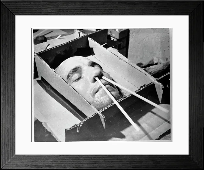 Framed Print : Harold Tasker Posing for a Plaster Mask Framed Print : Harold Tasker Posing for a Plaster Mask