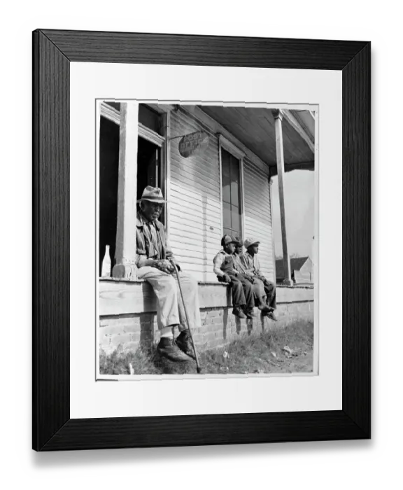 Framed Print : Children and Man Sit in Front of a General Store Framed Print : Children and Man Sit in Front of a General Store