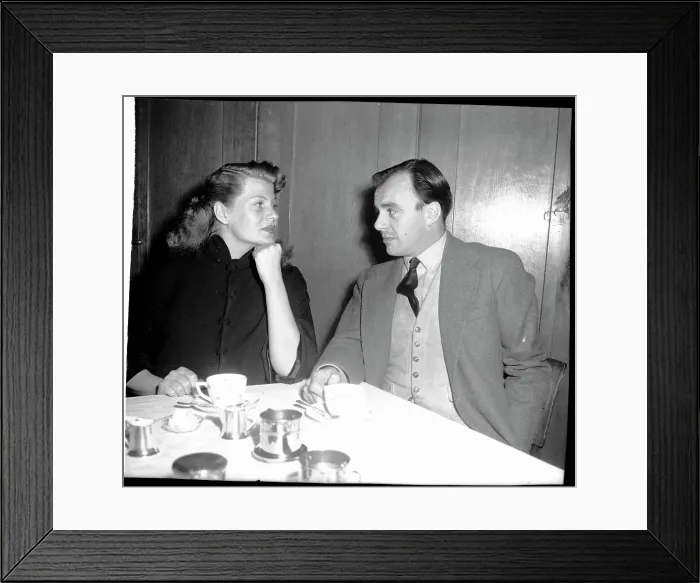 Framed Print : Aly Khan Looks Over to Rita Hayworth Framed Print : Aly Khan Looks Over to Rita Hayworth