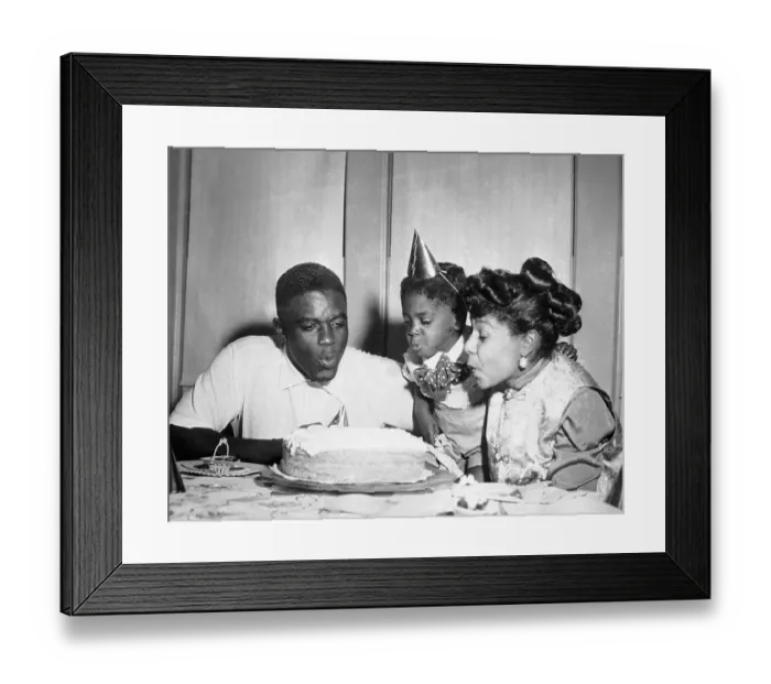 Framed Print : Mr. and Mrs. Jackie Robinson and Son Blow Birthday Cake Candles